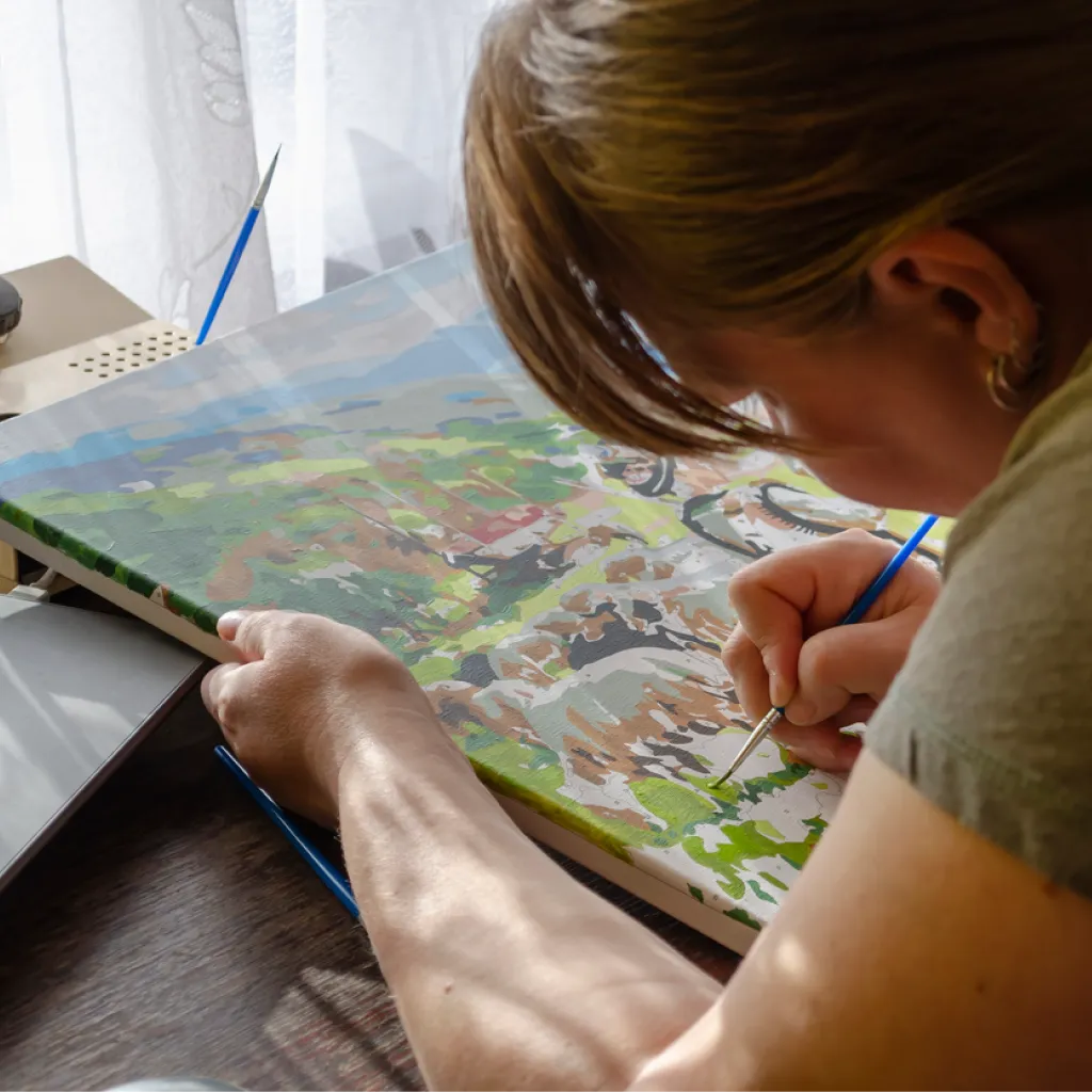 Painting a custom paint by numbers canvas, a relaxing screen-free hobby