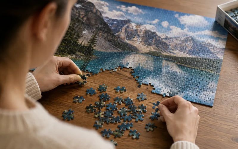 Piecing together a custom photo puzzle of a mountain landscape